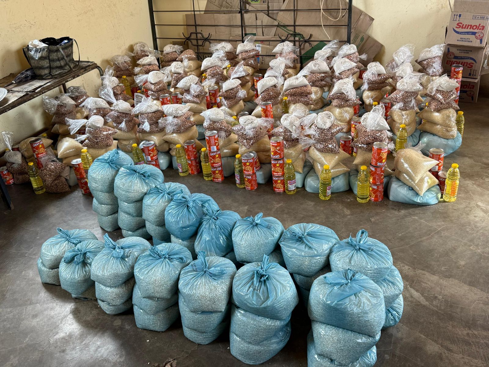 Rows of packed food parcels ready for distribution